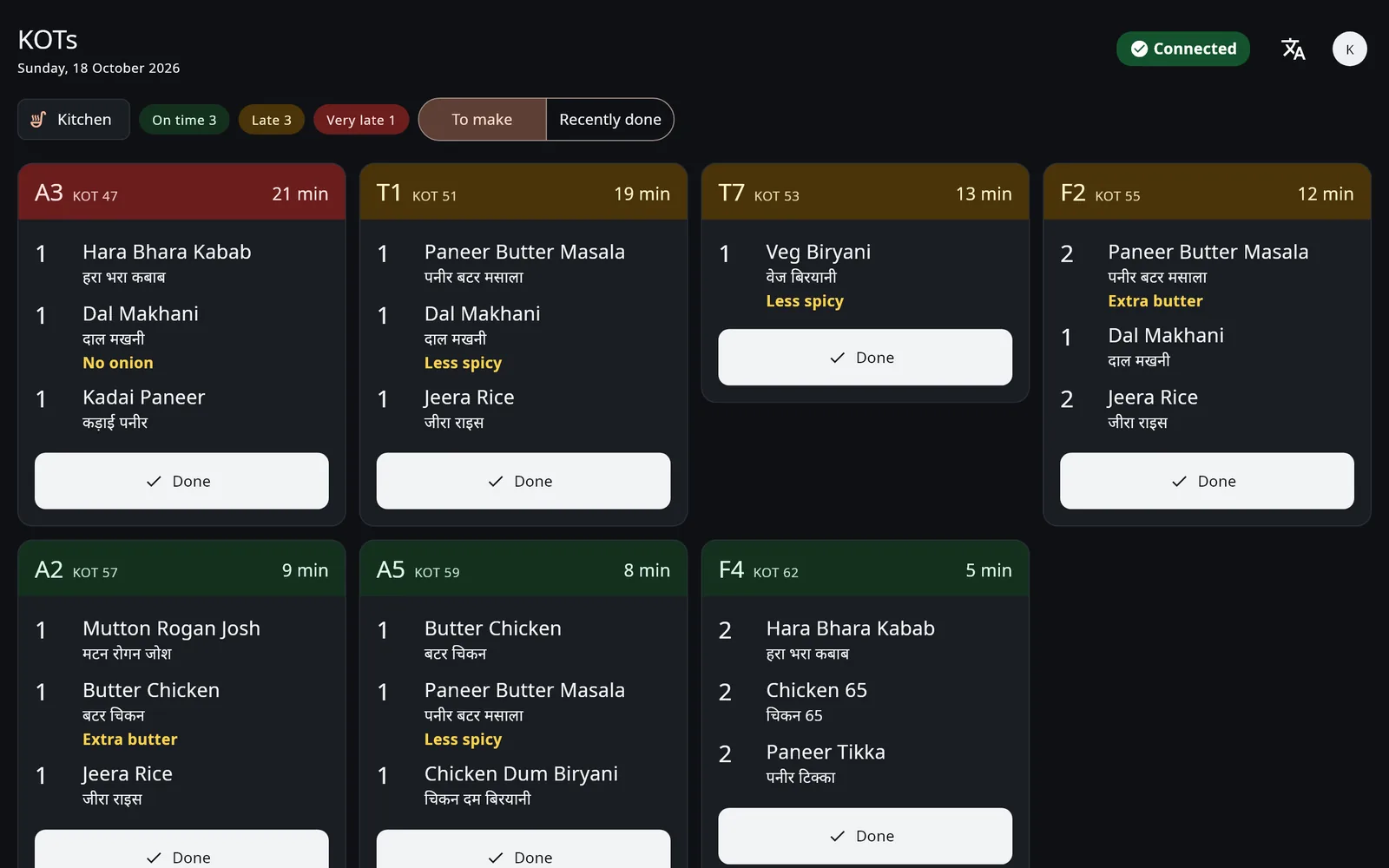 The kitchen screen on a tablet: KOTs oldest first with the minutes each has waited, late ones in amber and red, notes such as less spicy and no onion in yellow, and a Done button on each.